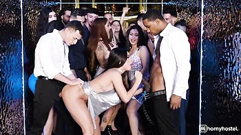 Martina Smeraldi is standing on the knees and sucking two big cocks