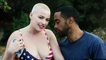 Stallion Strong and Riley Nixon enjoy a steamy outdoor encounter.