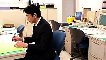 A blonde Japanese babe kisses another lesbian