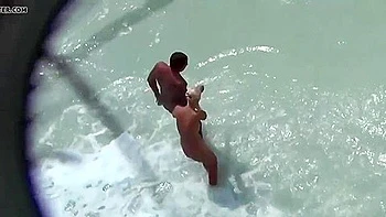 Spying For Couple Of Nudists Chilling On The Beach