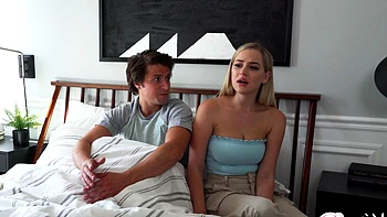 Jay Romero and stunning blondie Blake Blossom in a steamy bedroom scene.