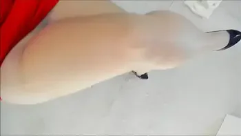 Naughty MILF Sonya showing her thick legs in tan nylon pantyhose and high heels POV