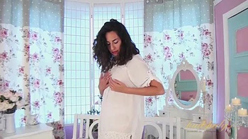 Liz teases and spreads her hairy pussy.