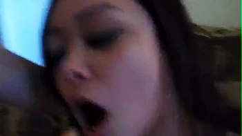 Азиатка-любительница сосет и трахает сзади с кончей внутри