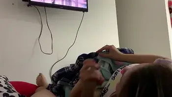 My little stepdaughter plays with my cock in her mouth while we watch a movie (She doesn't know I recorded it)